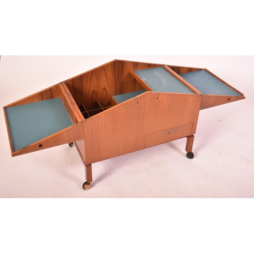 114 - Leif Alring for C.F. Christensen - Denmark - A retro mid 20th century circa 1960s teak wood rolling ... 