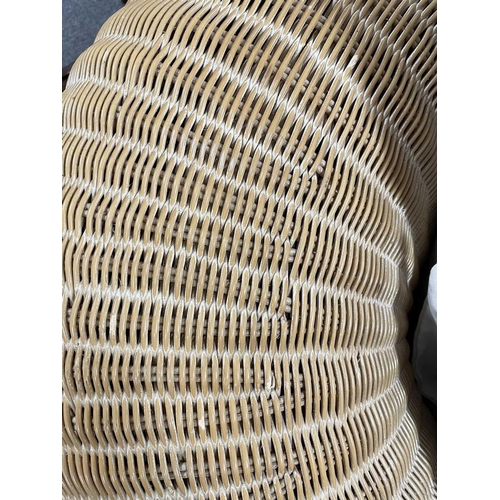 118 - Point Furniture - A modernist high end rattan pair of large armchairs together with a pair of rattan... 