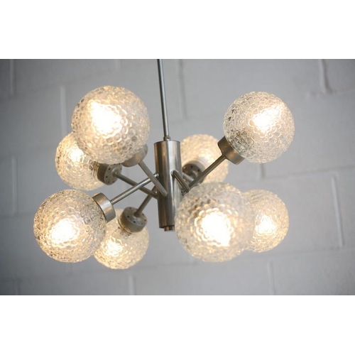 136 - A retro 20th century 1970s designer hanging ceiling light. The light having an aluminium frame and e... 