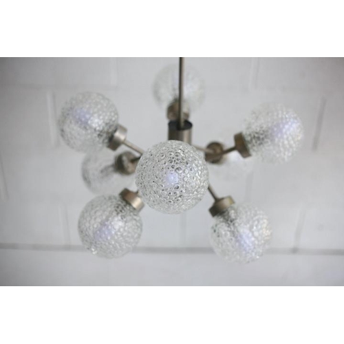 136 - A retro 20th century 1970s designer hanging ceiling light. The light having an aluminium frame and e... 