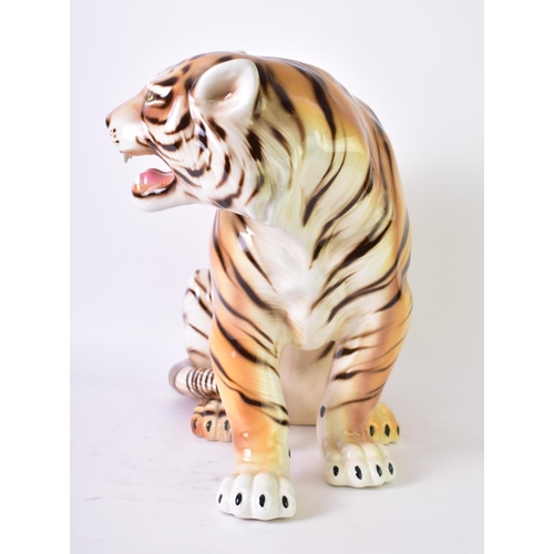 14 - A large 20th century 1960s Italian floor standing ceramic tiger. The tiger (Lionel) in the seated po... 