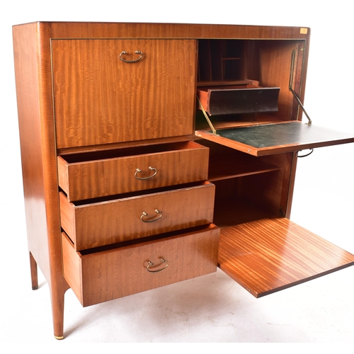 144 - White & Newton - A retro mid 20th century circa 1960s teak wood cocktail cabinet bureau. The cabinet... 