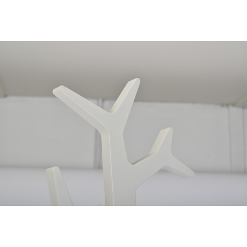 155 - Moleta Munro - A contemporary white tree shaped floor coat stand. The stand having multiple tree bra... 