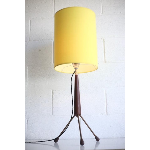 16 - A retro 20th century 1960s teak tripod table lamp light. The lamp having a chrome fitting and new ye... 