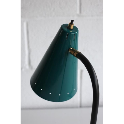 164 - A retro 20th century 1950s French designer desk / table lamp light. The lamp having a conical dark g... 