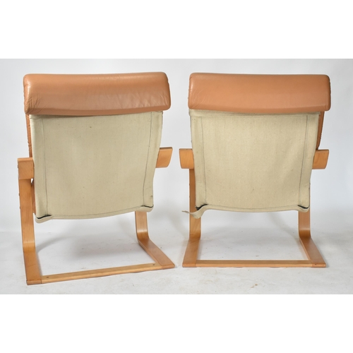 185 - Noboru Nakamura for Ikea - A pair of late 20th century designer leather and bentwood armchairs / eas... 