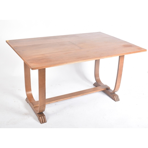 209 - An Art Deco early 20th century circa 1930s oak extending breakfast occasional table. The table havin... 