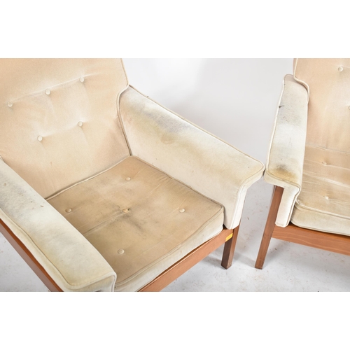 222 - Guy Rogers - A pair retro 20th century British design teak framed armchairs / easy lounge chairs. Ea... 