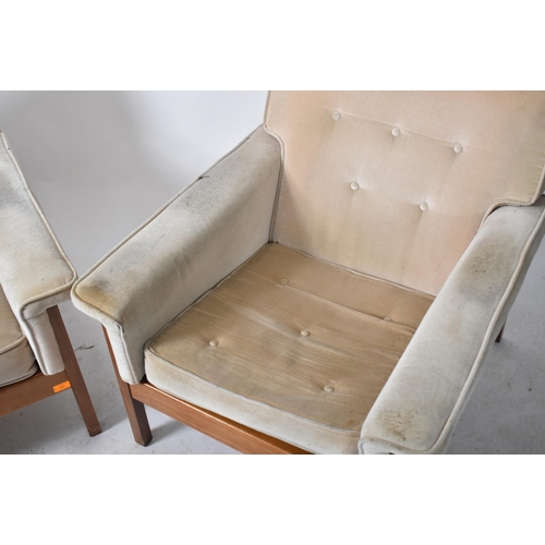 222 - Guy Rogers - A pair retro 20th century British design teak framed armchairs / easy lounge chairs. Ea... 