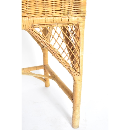 227 - A vintage 20th century wicker rattan writing office desk in the manner of Henry Link. The desk havin... 