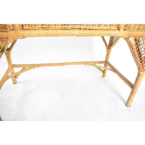 227 - A vintage 20th century wicker rattan writing office desk in the manner of Henry Link. The desk havin... 