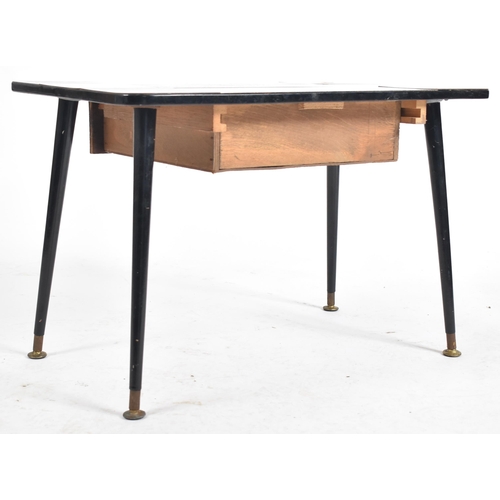 232 - A vintage mid 20th century single drawer coffee / low table. The table having a chequered formica to... 