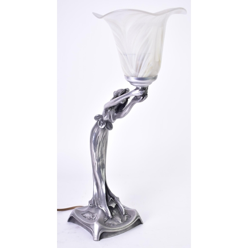 235 - An early 20th century Art Nouveau style figural table lamp, modelled a lady in goddess dress holding... 