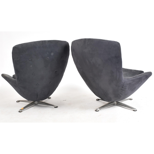 244 - In the manner of Dux, Sweden - A pair of vintage 20th century suede egg swivel office chairs. Each a... 