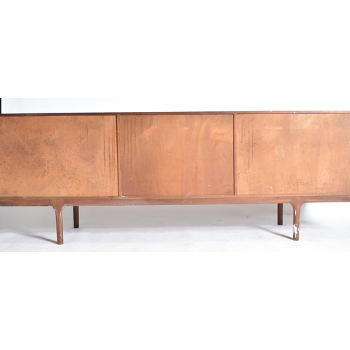 247 - A. H. Mcintosh & Co - A retro 20th century teak wood sideboard credenza. The sideboard having a cent... 