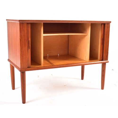 252 - A Danish inspired retro mid 20th century circa 1950s teak wood vinyl / side cupboard. The cabinet ha... 