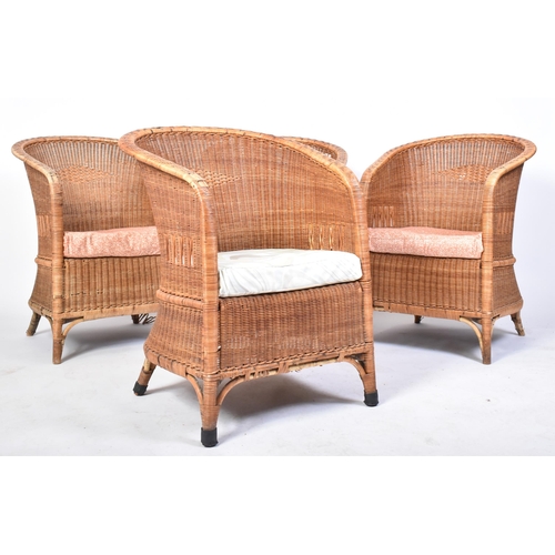 258 - Dryad - A matching set of four 20th century Art Deco rattan / wicker woven tub armchairs. Each chair... 