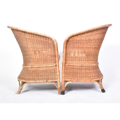 258 - Dryad - A matching set of four 20th century Art Deco rattan / wicker woven tub armchairs. Each chair... 