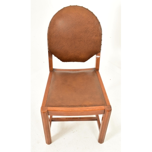 270 - A set of four Art Deco early 20th century circa 1930s oak & tan leather dining chairs. Each chair ha... 