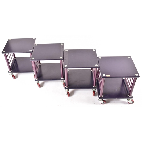 277 - Haworth Inc - a set of four modern American Haworth late 20th century purple metal side tables drink... 