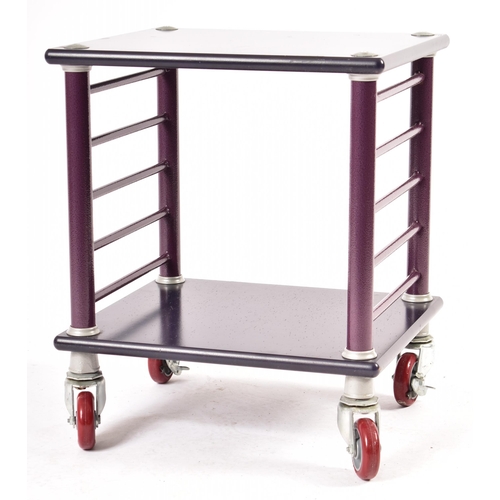 277 - Haworth Inc - a set of four modern American Haworth late 20th century purple metal side tables drink... 