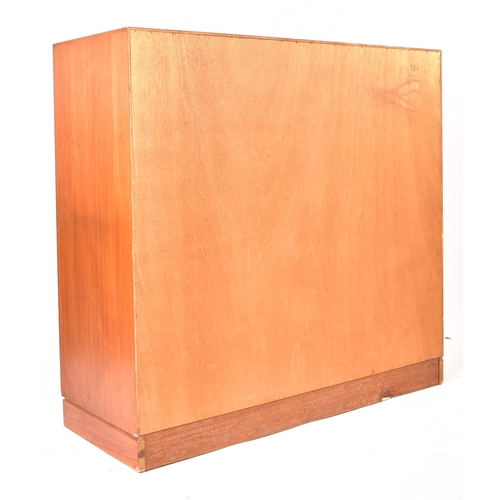 285 - A Danish retro mid 20th century circa 1960s teak wood chest of drawers highboard. The chest having a... 