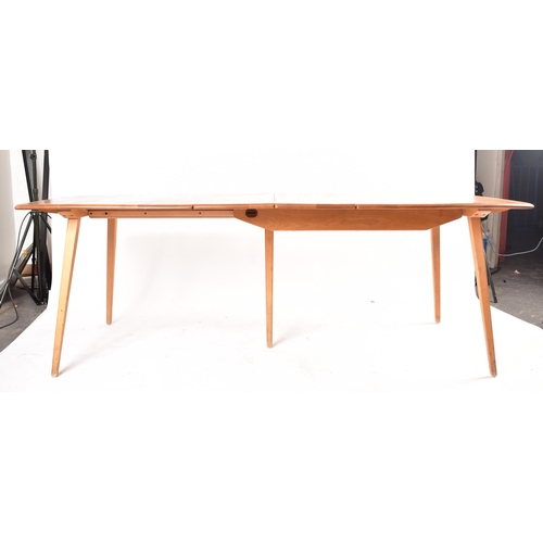 286 - Lucian Ercolani - Ercol - Grand Plank - A large retro mid 20th century beech and elm extending dinin... 