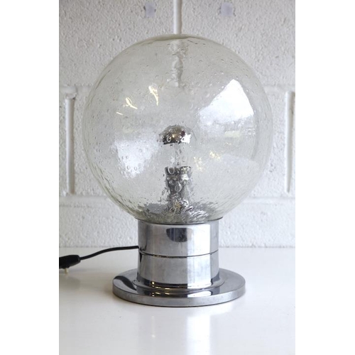 316 - A retro 20th century 1970s chrome and glass table lamp light. The lamp having a large bubble effect ... 