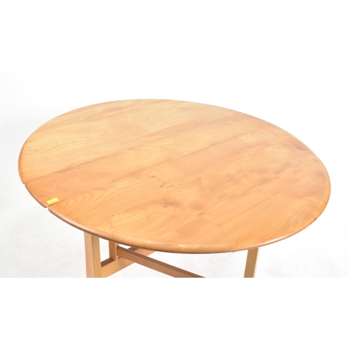 321 - Lucian Ercolani - Ercol - Model 610 -  A 20th century beech and elm wood drop leaf / gate leg dining... 