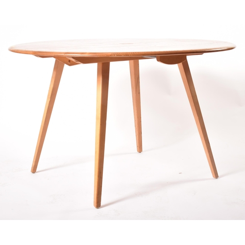 330 - Lucian Ercolani for Ercol Furniture - A retro 20th century Windsor pattern beech and elm drop-leaf d... 