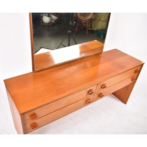 343 - Stag - A retro mid 20th century British designed teak dressing table chest. The dressing table havin... 