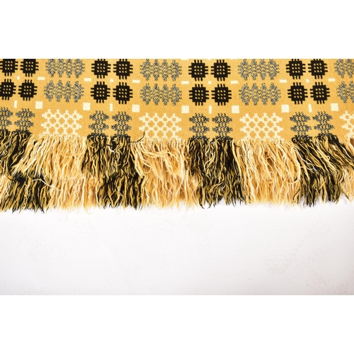 359 - A vintage 20th century hand made woollen traditional Welsh blanket. Meadow green, cream and yellow g... 