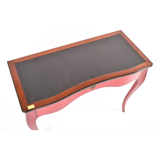 360 - Roche Bobois - Paris - A serpentine fronted walnut & red lacquered writing desk in the Louis XV mann... 