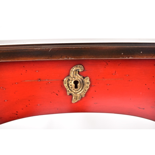 360 - Roche Bobois - Paris - A serpentine fronted walnut & red lacquered writing desk in the Louis XV mann... 