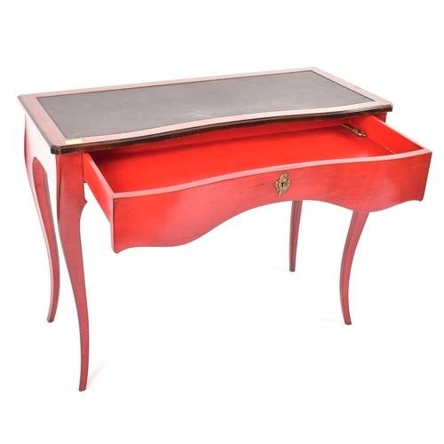 360 - Roche Bobois - Paris - A serpentine fronted walnut & red lacquered writing desk in the Louis XV mann... 