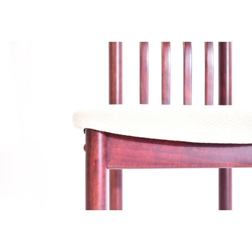 367 - A matching set of four 20th century Danish designer teak wood dining chairs. Each chair having curve... 