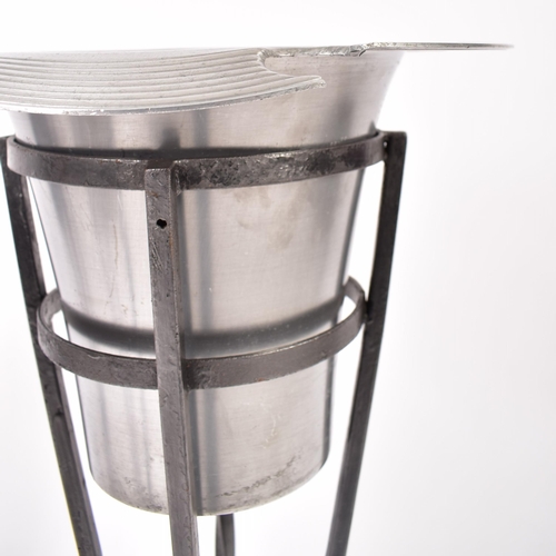 374 - Three vintage late 20th century chrome stainless steel champagne ice buckets, each in a twisted cast... 