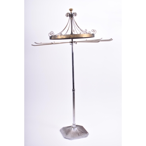 397 - A collection of three early 20th century circa 1930s onwards chrome haberdashery shop display stands... 