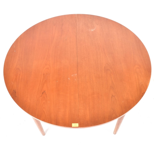 412 - G Plan - A retro mid 20th century 1960s teak wood dining table and matching eight chairs. The extend... 