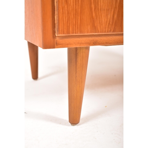 462 - A Scandinavian Swedish retro mid 20th century circa 1960s teak chest of drawers on legs. The chest h... 