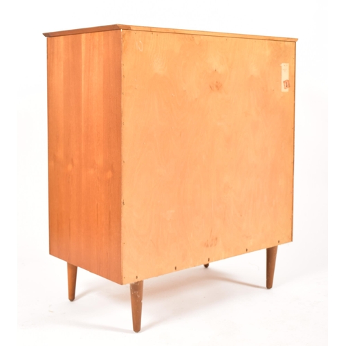 462 - A Scandinavian Swedish retro mid 20th century circa 1960s teak chest of drawers on legs. The chest h... 