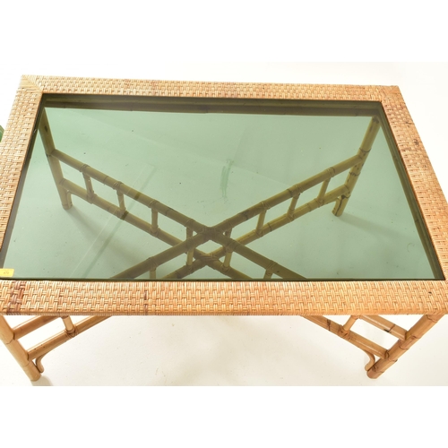 470 - A retro 20th century bamboo rattan conservatory garden dining table. The table having a central tint... 