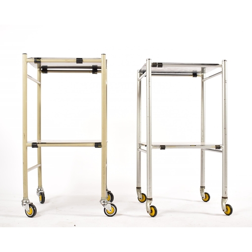 479 - A selection of four 20th century stainless steel medical / hospital trolleys. One trolley having two... 