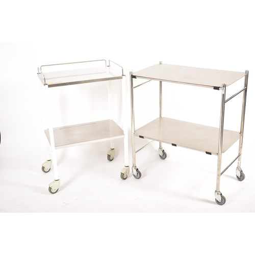 479 - A selection of four 20th century stainless steel medical / hospital trolleys. One trolley having two... 