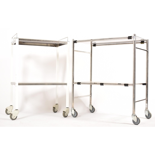 479 - A selection of four 20th century stainless steel medical / hospital trolleys. One trolley having two... 
