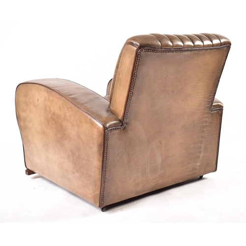 5 - An Art Deco early 20th century circa 1930s green leather club armchair. The lounge chair having a ri... 