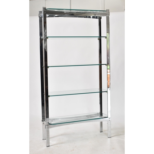 58 - Richard Young for Merrow Associates - A retro 20th century 1970s chrome & glass upright shelving uni... 