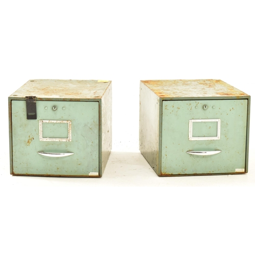 595 - A pair of vintage 20th century painted metal filing stacking storage cabinets. Each cabinet in a gre... 