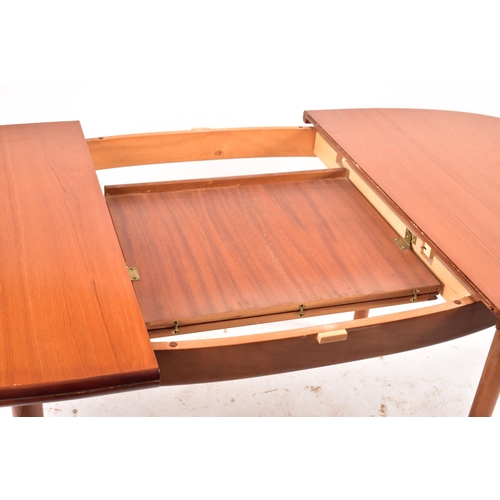 596 - Nathan Furniture - A retro 20th century British design teak dining table and matching six chairs. Th... 