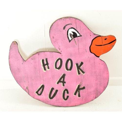 597 - Hook A Duck - A vintage 20th century fairground / funfair hand painted sign in the form of duck. The... 